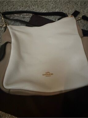 COACH Two-Tone Leather Shoulder Bag in Cream and Taupe with Black Strap.